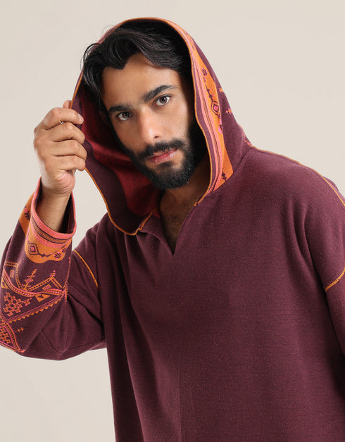 Patterned jacquard hooded sweater with long sleeves and pockets
